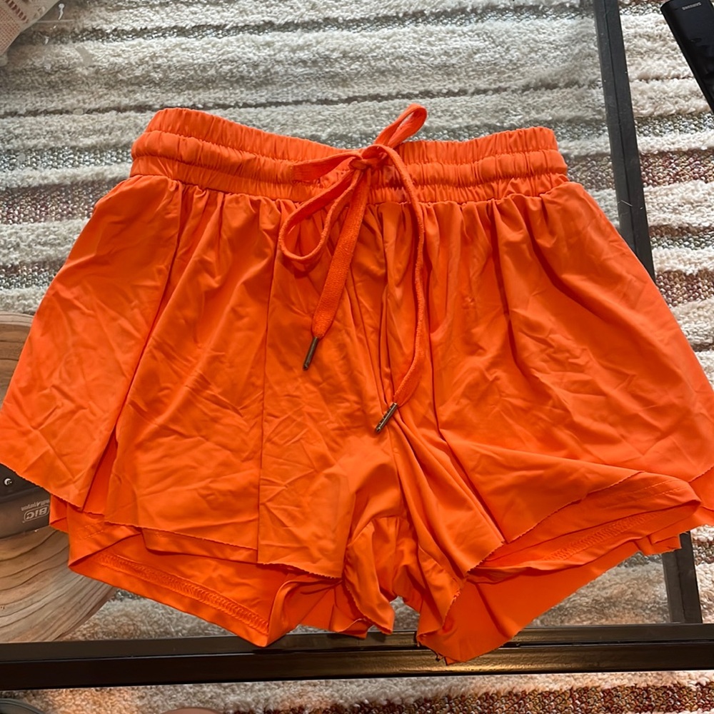 Orange dolphin shorts